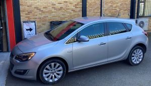 Vauxhall Astra 2012 fitted with Kenwood DMX125DAB, Reversing Cam