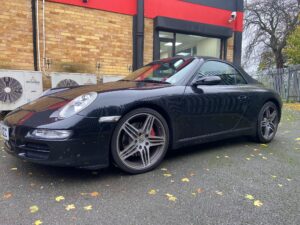 Porsche 997 2009 model upgraded with Pioneer SPH-DA360DAB and Kenwood CMOS-230 Camera