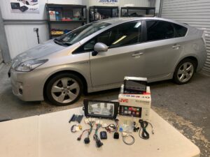 Toyota Prius 2011 model upgraded with a JVC KW-M785DBW CarPlay/Android Auto stereo & CMOS-230 Reversing Camera